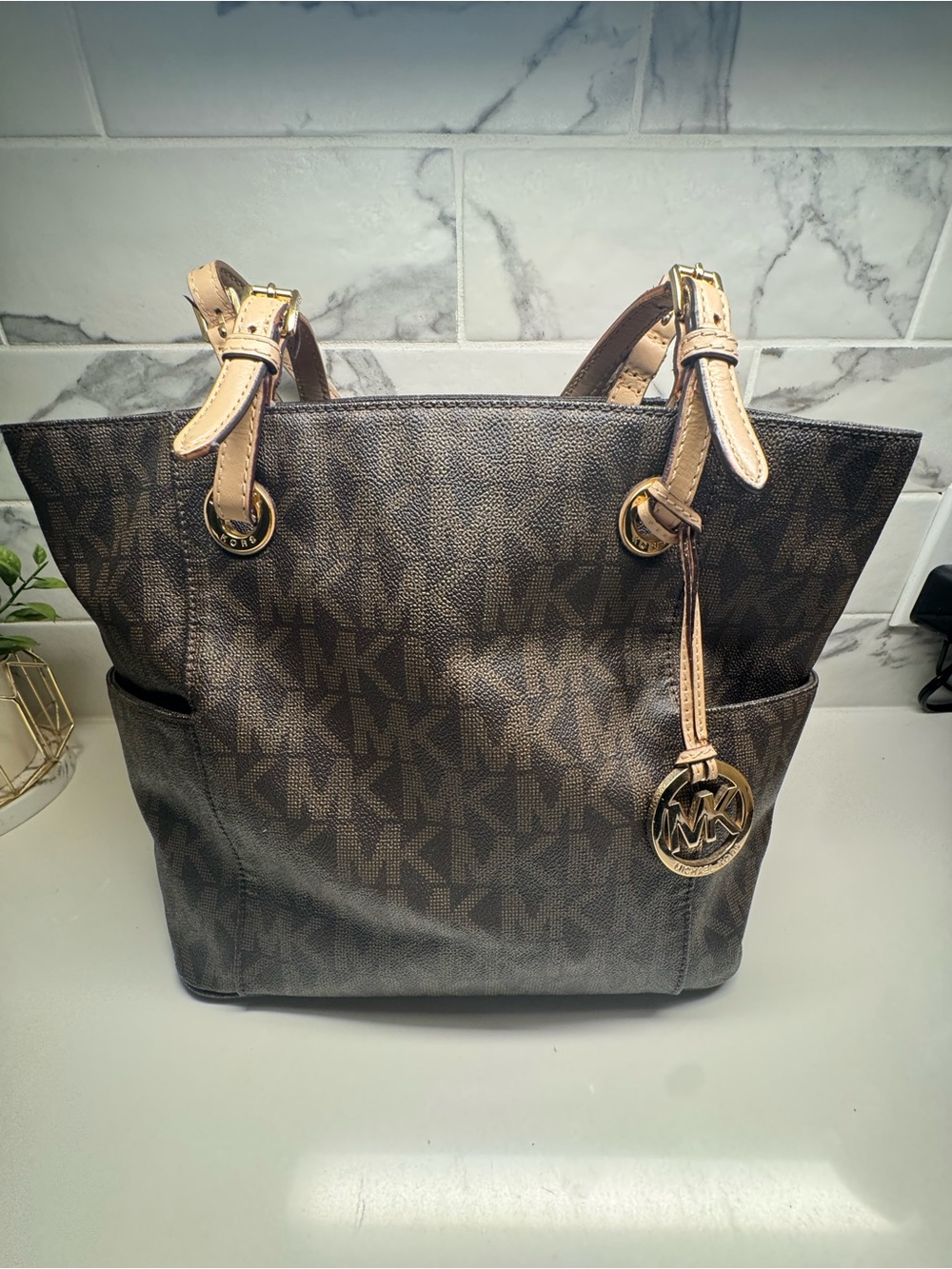 Michael Kors Jet Set Travel Top Zip Tote in the signature monogram canvas patter